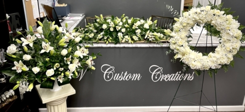 Eternal Peace Package. Full Casket, Large Vase Spray, Standing Wreath (Call for pricing and availability)