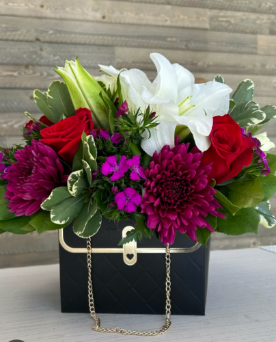 Flower Pocket-Book Arrangement. $39.99 IN-STORE ONLY